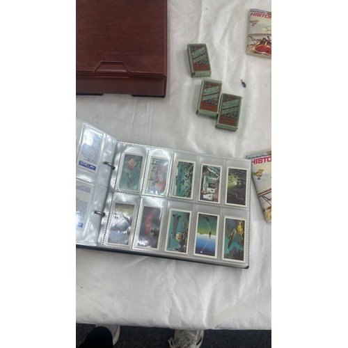 149 - Selection of tea and cigarette cards to include Army Badges, flags, gold, aviation etc