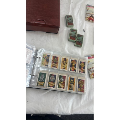 149 - Selection of tea and cigarette cards to include Army Badges, flags, gold, aviation etc