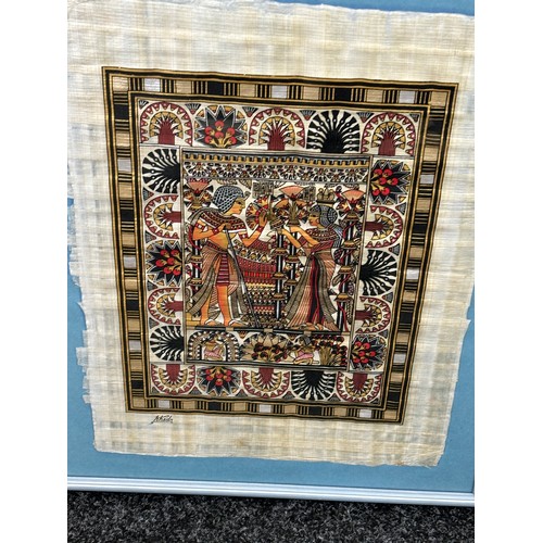 72 - Framed Egyptian embroidery on cloth, signed measures approximately 21 inches by 17 inches