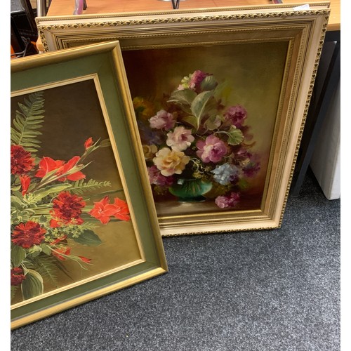 244 - Two framed paintings depicting flowers and a framed wooden tapestry largest measures approximately 1... 