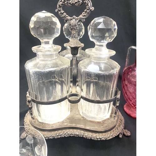 124 - Selection of vintage glassware to include a set of three decanter set, cranberry glass etc