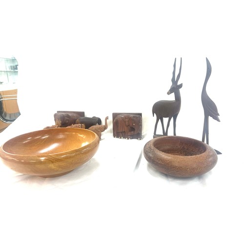 42 - Selection of wooden items to include animal figures, elephants book ends, bowls etc