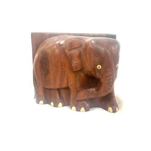 42 - Selection of wooden items to include animal figures, elephants book ends, bowls etc