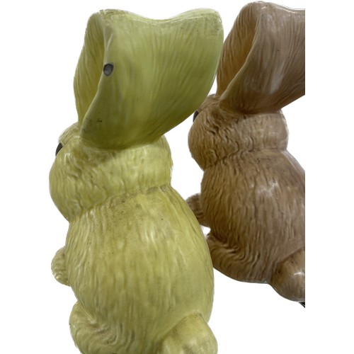 52 - Two large Sylvac porcelain rabbit ornaments one beige colour, one lemon, overall measurements approx... 