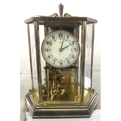 4 - Metamec mantel clock and a Kunder carriage clock overall height of tallest 8.5 inches tall