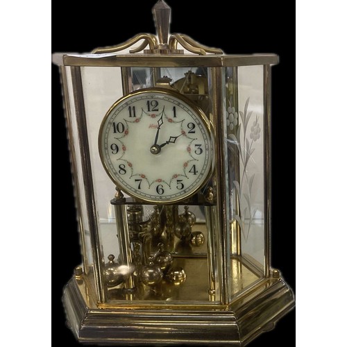 4 - Metamec mantel clock and a Kunder carriage clock overall height of tallest 8.5 inches tall