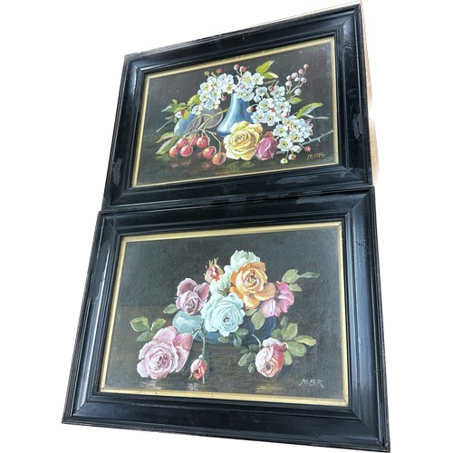 9 - Two framed paintings depicting floral arrangements signed MBR, frame measures approximately 19 inche... 