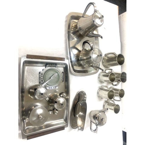 148 - Selection of stainless steel, pewter items to include coffee pot, tea pot, trays, gravy boat, tankar... 