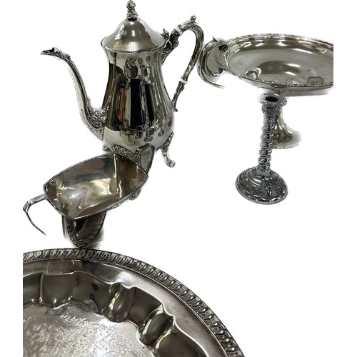 167 - Large selection of silver plated items to include a tea pots, trays, candle sticks, etc