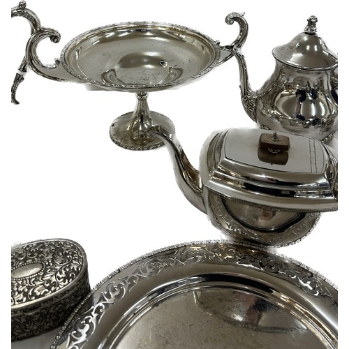 167 - Large selection of silver plated items to include a tea pots, trays, candle sticks, etc