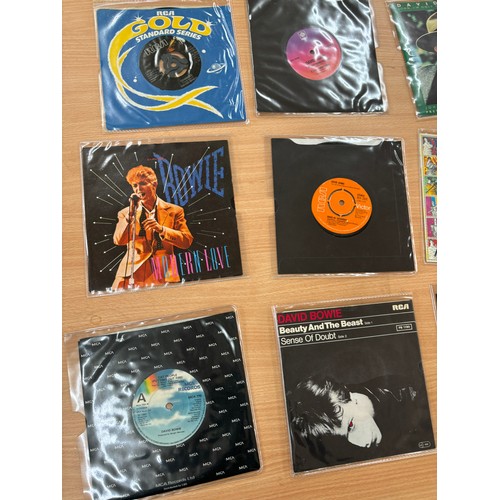 39 - 12 David Bowie singles to includes Fashion, Scary Monsters, Jean Genie etc