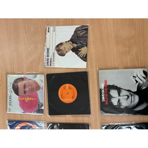 46 - 12 David Bowie singles to includes Changes, golden year etc