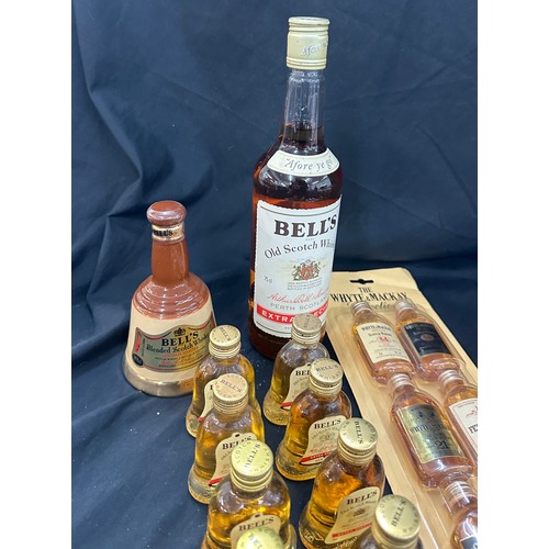 514 - Selection of whisky alcohol to include bells whisky miniatures, bells 75cl bottle etc