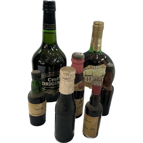 516 - Selection of assorted port, wines and sherry