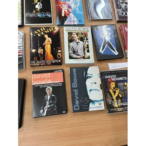 137 - Selection of 21 David Bowie DVDS to include starman, Sploers from mars etc