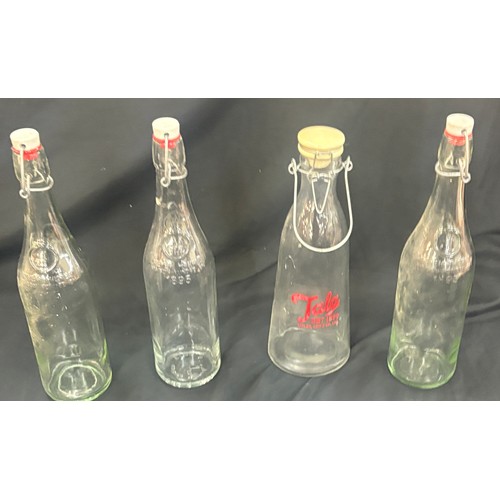 92 - Four vintage bottles overall height approximately 13 inches tall