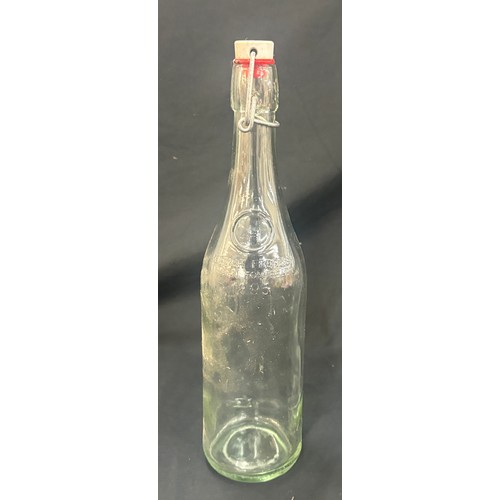 92 - Four vintage bottles overall height approximately 13 inches tall