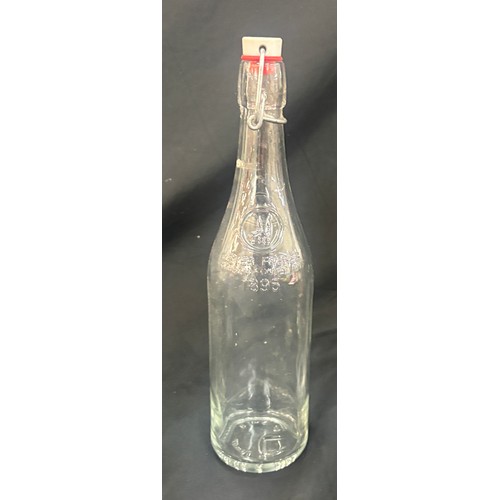 92 - Four vintage bottles overall height approximately 13 inches tall