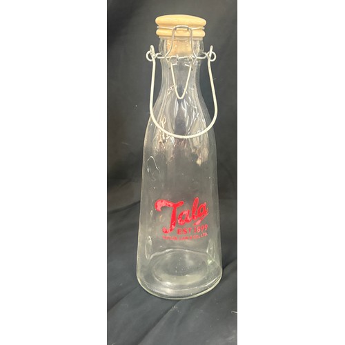 92 - Four vintage bottles overall height approximately 13 inches tall