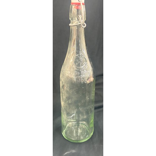 92 - Four vintage bottles overall height approximately 13 inches tall