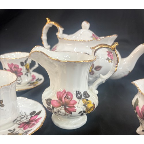 164 - Vintage 6 piece tea set complete with tea pot, cups and saucers, milk jug and sugar bowl