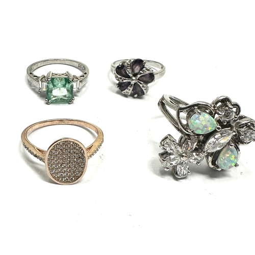 238 - 4 vintage sterling silver gemstone set rings