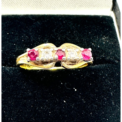 496 - 18ct gold diamond & ruby ring weight 2.54g