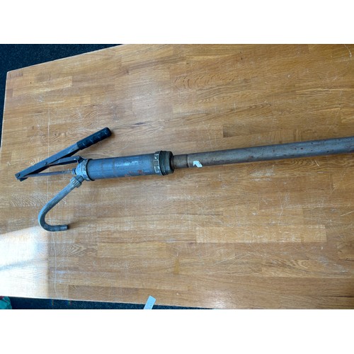 121 - Vintage oil pump, length approximately 38 inches long