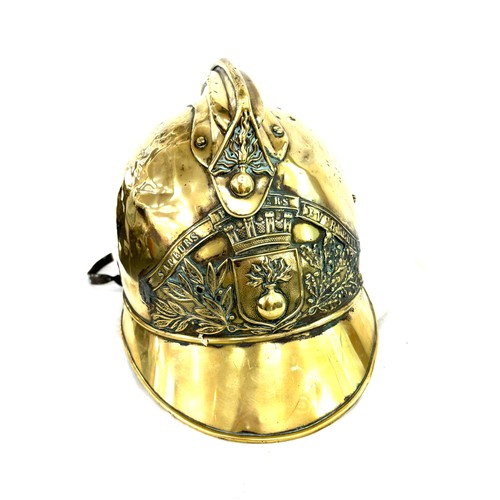 110 - French Fireman's brass helmet, height approximately 8 inches