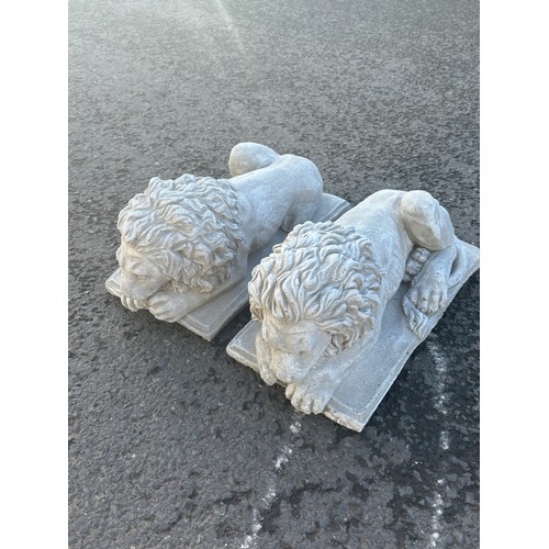 100H - Pair of laying concrete Chatsworth lions, each measure approximately Length 14 inches, Height 8.5 in... 