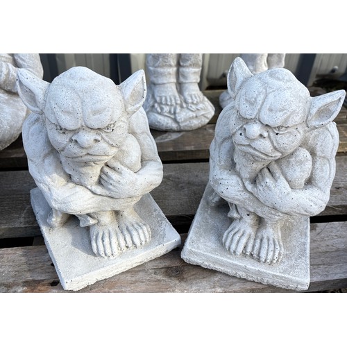 101F - Pair of small concrete grummy gargoyles, approximate height 11 inches