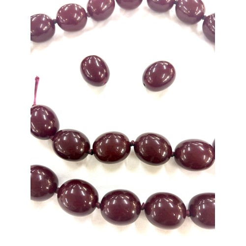 449 - Cherry Red amber bakelite type beads, total weight 233g