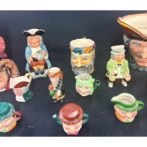 112 - Selection of character jugs to include some  Royal Doulton pieces