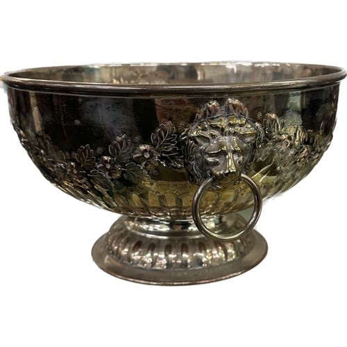 24 - Two silver plated lion handled bowls largest measures approximately 6 inches tall 10 inches diameter