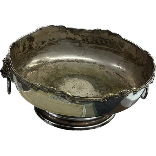 24 - Two silver plated lion handled bowls largest measures approximately 6 inches tall 10 inches diameter