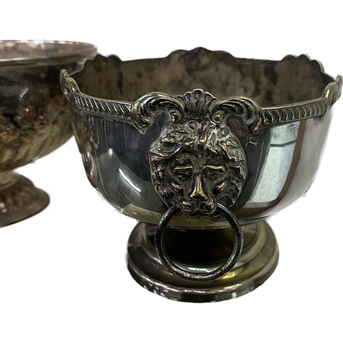 24 - Two silver plated lion handled bowls largest measures approximately 6 inches tall 10 inches diameter