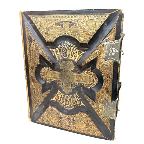 70 - Vintage Holy bible, 1890 copy right 13 inches tall 11 inches wide 6 inches depth