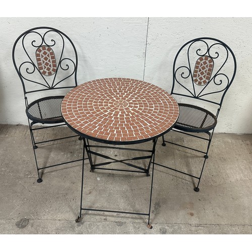 100C - Folding metal mosaic top table and two chairs