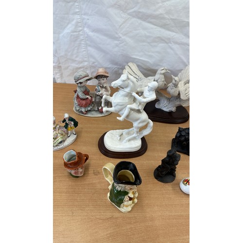 123 - Selection of assorted figures includes Beswick (a/f), toby jugs etc