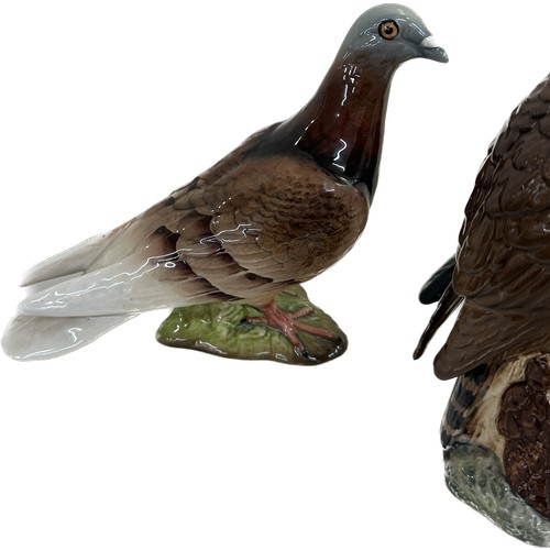 3 - Three Beswick bird ornaments a pigeon, magpie and eagle, tallest measures approximately 7.5 inches t... 