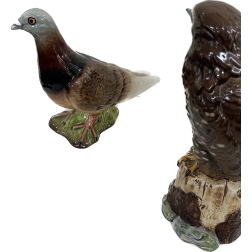 3 - Three Beswick bird ornaments a pigeon, magpie and eagle, tallest measures approximately 7.5 inches t... 