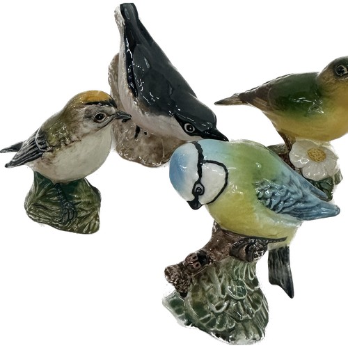 24 - Selection of five Beswick bird ornaments