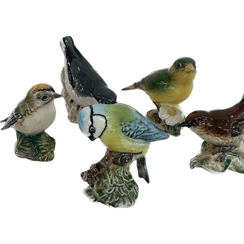 24 - Selection of five Beswick bird ornaments