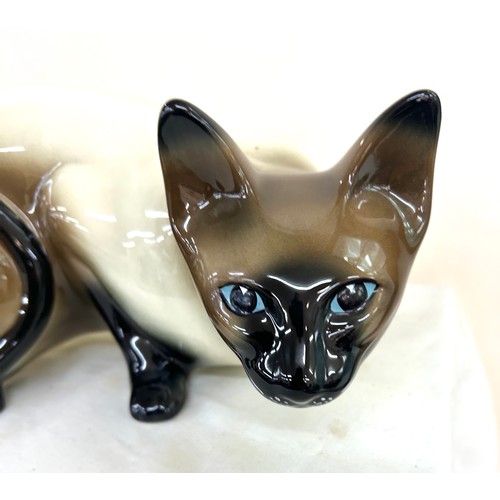 74 - Large vintage ceramic pottery Siamese cat measures approximately 13 inches wide