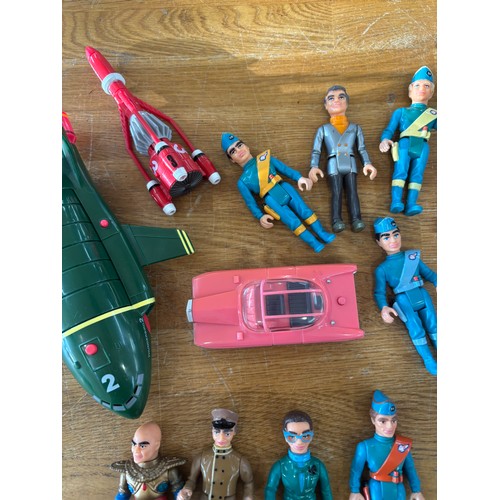 64 - Selection of thunder bird figures etc,