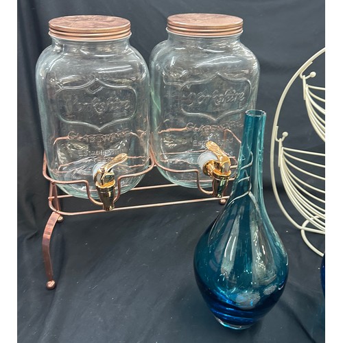 109 - Selection of homeware items to include a rose gold drinks dispenser, pair of blue coloured vases and... 