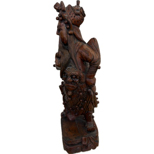 37 - Oriental carved wooden figure height 17 inches tall