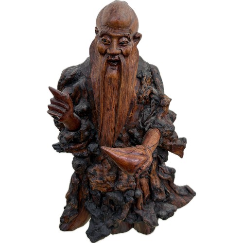 5 - Oriental carved wooden figure height 17 inches tall