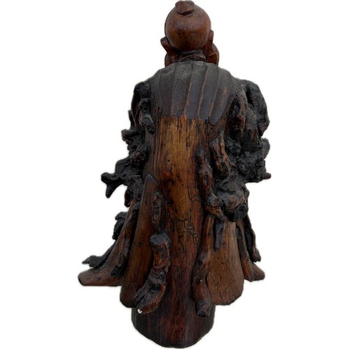 5 - Oriental carved wooden figure height 17 inches tall