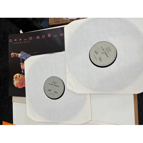 60A - Two David Bowie records includes Japan 1983 and He Never let us down Promotional copy